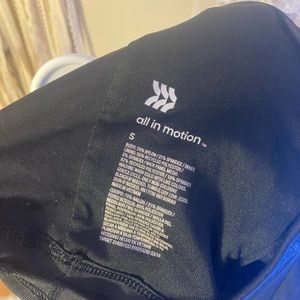 all in motion womens high rise black tank top with mesh in back side. size xs